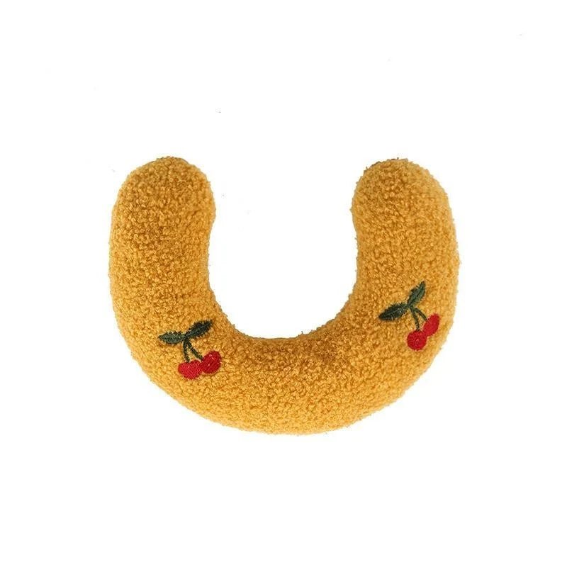 Détail du rembourrage doux du coussin en forme de U