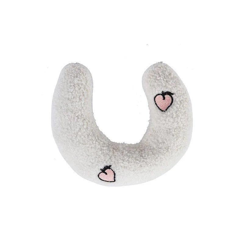 Détail du rembourrage doux du coussin en forme de U
