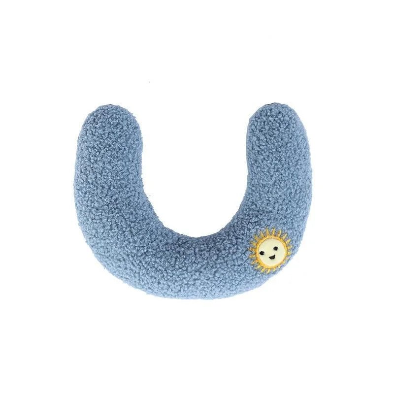 Détail du rembourrage doux du coussin en forme de U