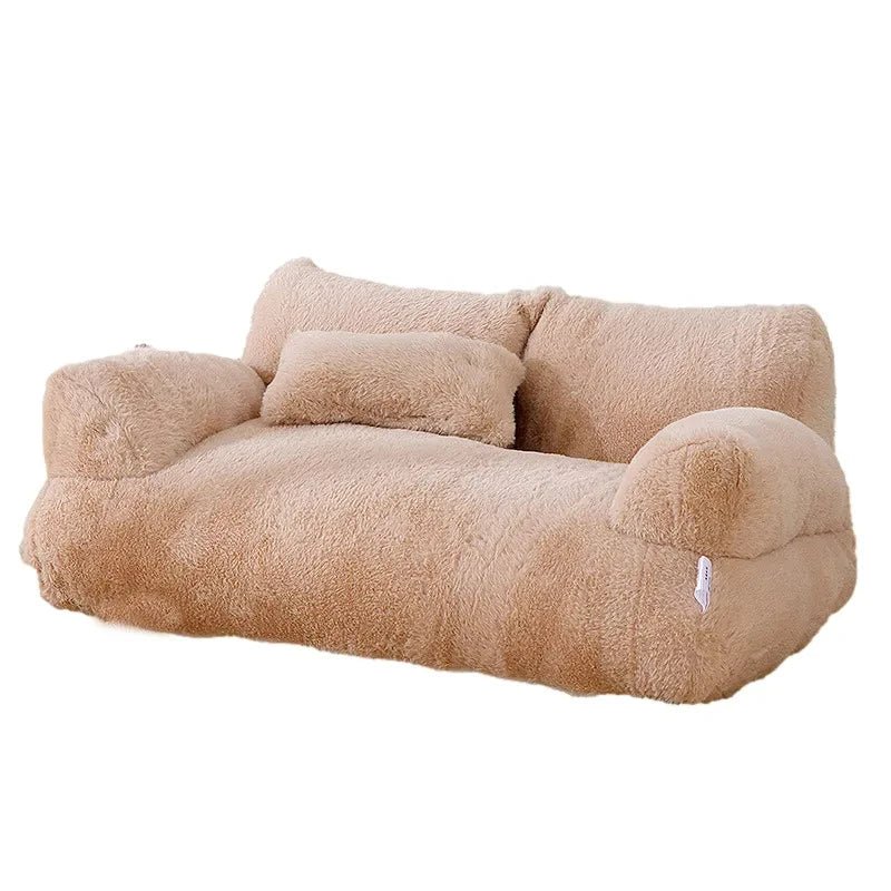 Panier sofa pour chat installé dans un salon cosy